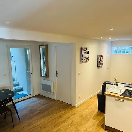 En Rez-de-maison Appartement *